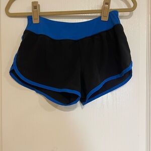 Authentic American Heritage blue and black shorts​​​​​